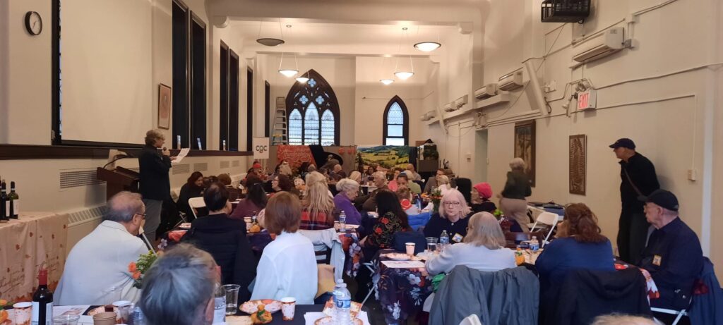 A recent Caregivercare Thanksgiving Day Dinner, held on November 28, 2024 at Saint Thomas More Church. Pictured left is Gianni Perilli, President of CareGiverCare, and seated are members of CCGC.