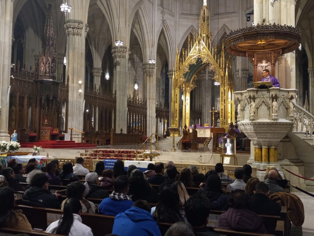 Father Pedro Bismarck Chau delivers his homily during the annual Mass in honor of La Inmaculada Concepción de María -- La Purisima, St. Patrick’s Cathedral, Sunday, December 1, 2024.