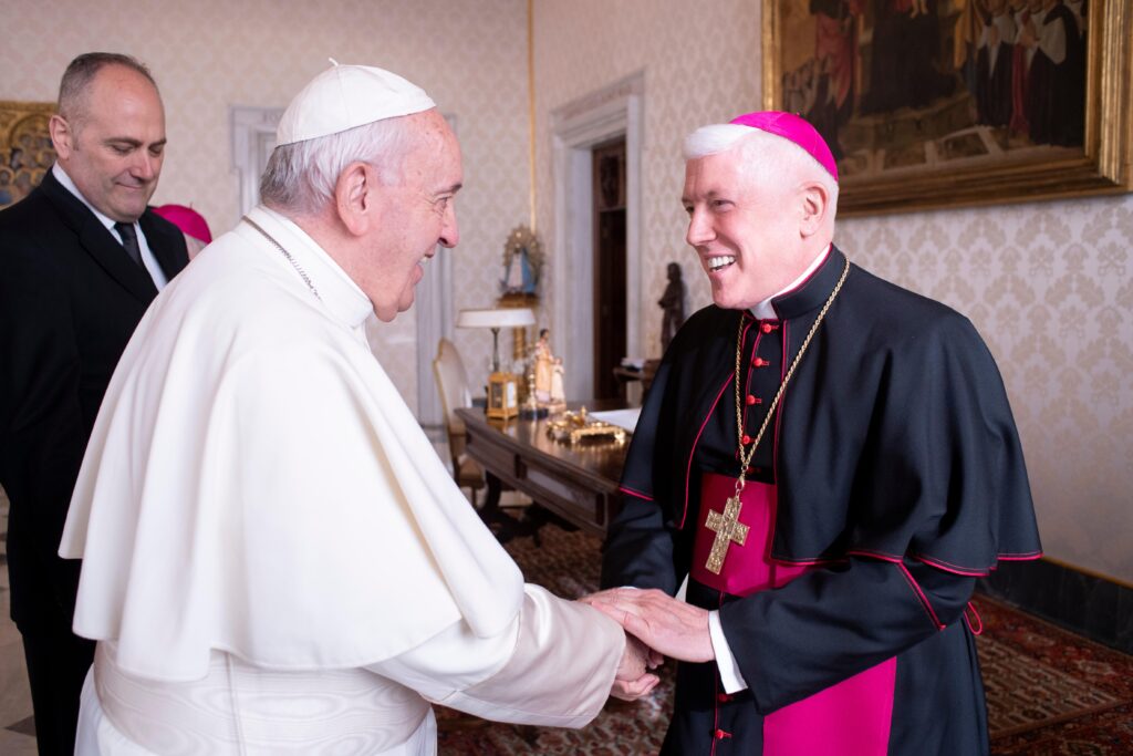 Pope Francis greets Bishop Daniel E. Thomas of Toledo, Ohio (right), during a meeting with U.S. bishops from Ohio and Michigan making their "ad limina" visits to the Vatican December 10, 2019.