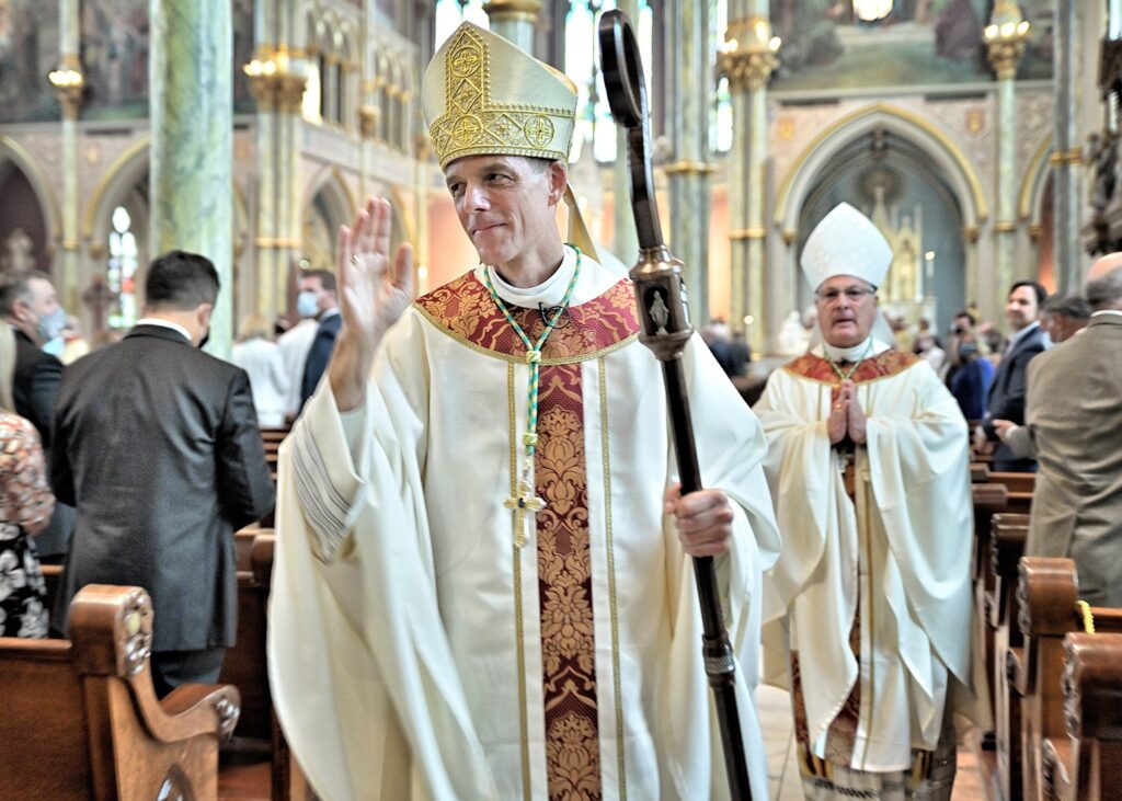 Bishop Stephen D. Parkes processes down the center aisle at the end of his installation Mass as the new bishop of Savannah, Georgia, September 23, 2020, at the Cathedral Basilica of St. John in Savannah.