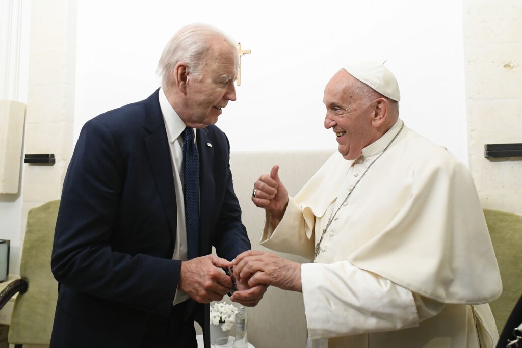 Pope Francis gives U.S. President Joe Biden a thumbs up during a private meeting on the margins of the Group of Seven summit in Borgo Egnazia, in Italy's southern Puglia region, June 14, 2024.