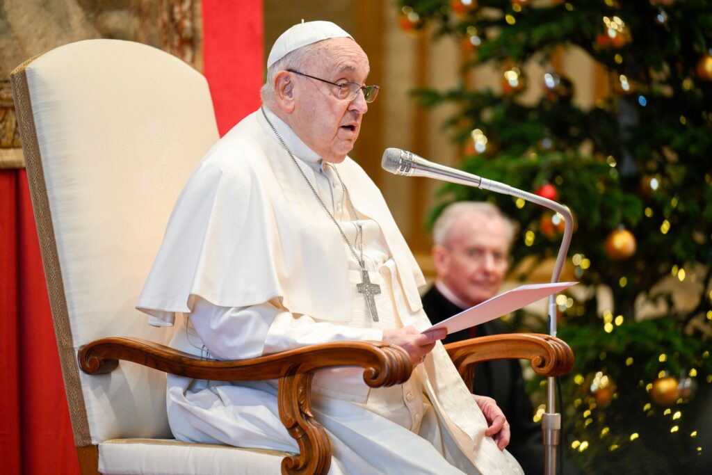 Pope Francis talks briefly to ambassadors and diplomats accredited to the Holy See during their annual meeting in the Hall of Blessing in the Apostolic Palace at the Vatican January 9, 2025. (CNS photo/Vatican Media)