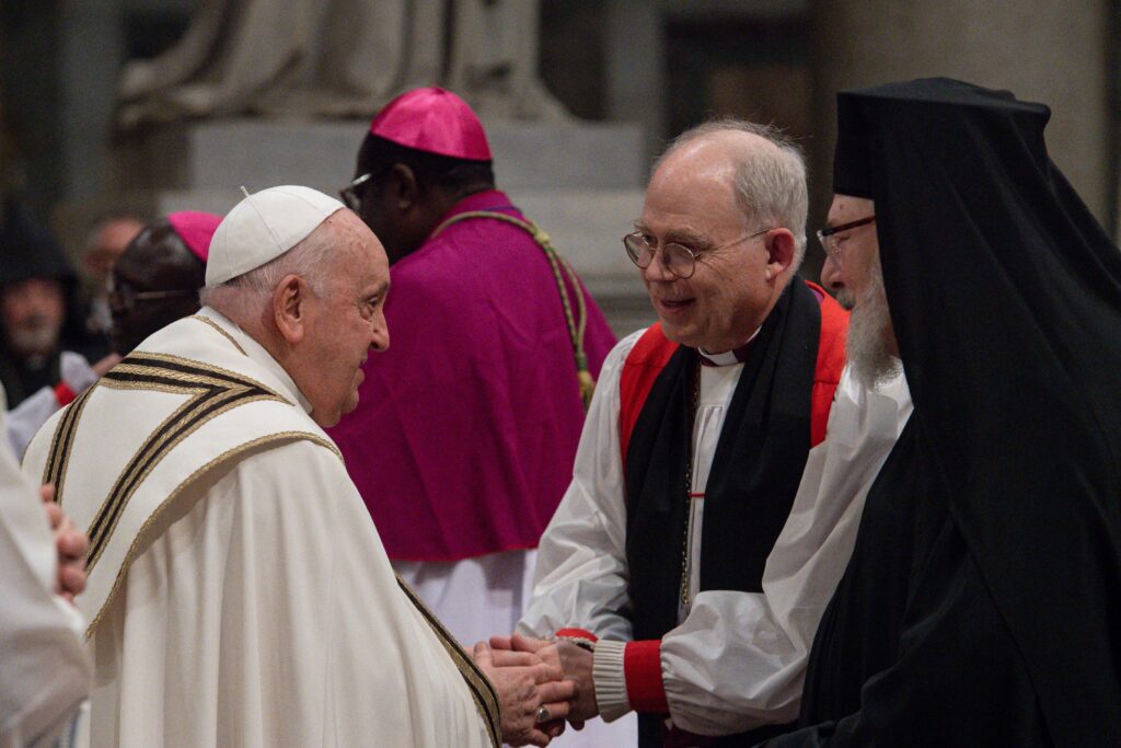 Pope Francis greets Episcopalian Bishop John Bauerschmidt of Tennessee and Romanian Catholic Bishop John M. Botean of the Eparchy of St. George in Canton, Ohio, at the end of an ecumenical prayer service at Rome's Basilica of St. Paul Outside the Walls in this file photos from January 25, 2024.