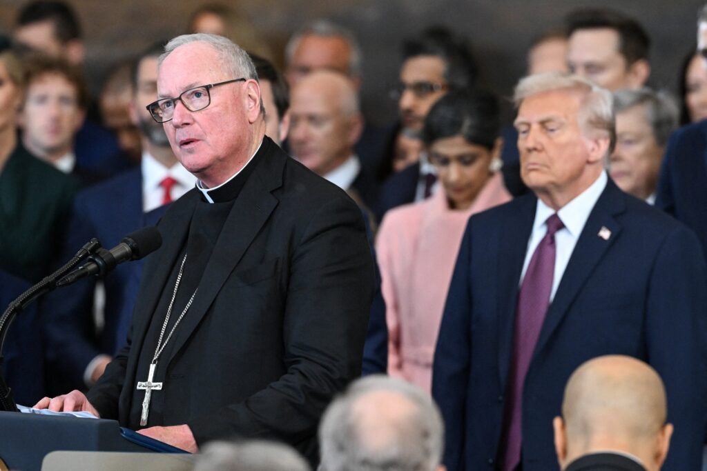 New York Cardinal Timothy M. Dolan delivers the invocation during U.S. President Donald Trump's swearing-in as the 47th U.S. president in the U.S. Capitol Rotunda in Washington on January 20, 2025.