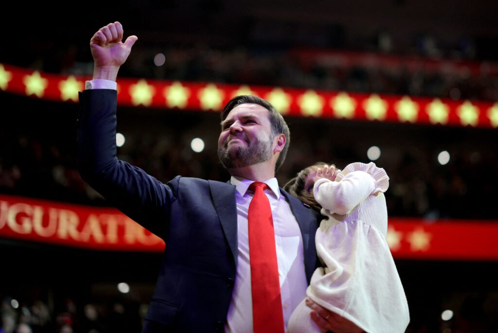 U.S. Vice President J.D. Vance holds his daughter, Mirabel, while attending the inaugural parade inside Capital One Arena on the Inauguration Day in Washington January 20, 2025.