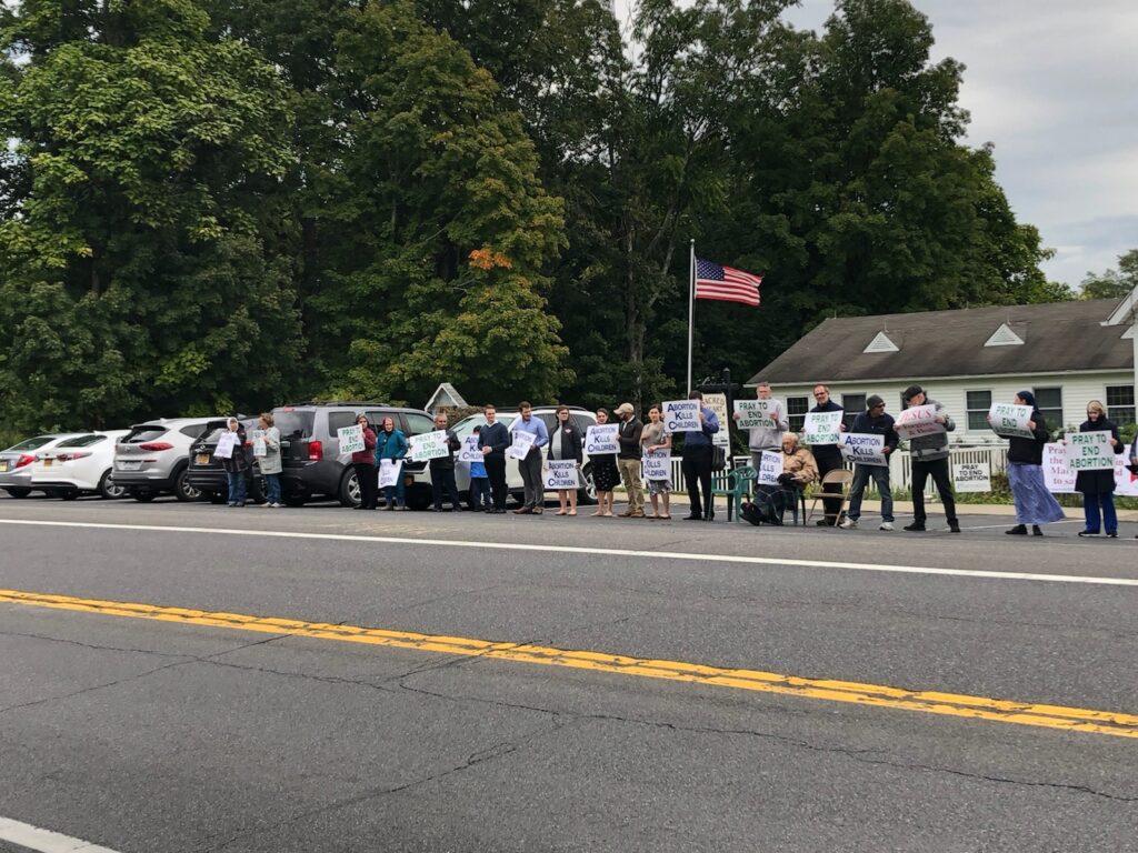 Parishioners and supporters of Presentation-Sacred Heart Parish participate in a 2022 Life Chain.