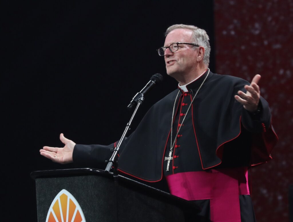 Bishop Robert E. Barron of Winona-Rochester, Minn., speaks during the July 20, 2024, revival night of the National Eucharistic Congress at Lucas Oil Stadium in Indianapolis.