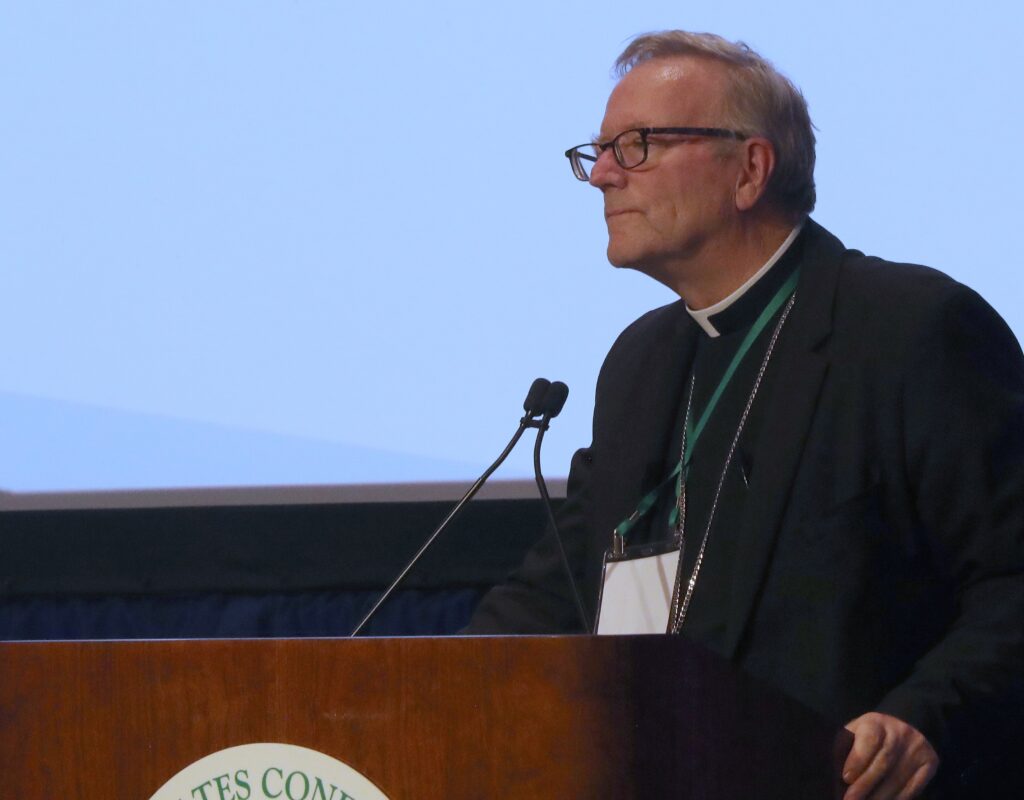 Bishop Robert E. Barron of Winona-Rochester, Minnesota, listens to a question while delivering remarks during a November 13, 2024, session of the fall general assembly of the U.S. Conference of Catholic Bishops in Baltimore.