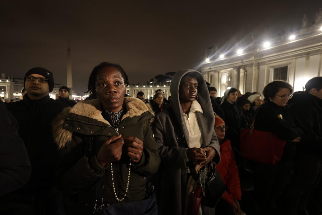 People join Cardinal Pietro Parolin, Vatican secretary of state, in reciting the rosary for Pope Francis in St. Peter's Square at the Vatican on February 24, 2025.