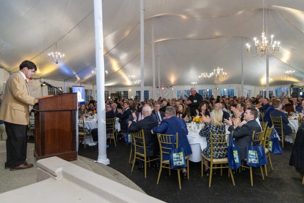 SMA graduate Alexis Mendoza announcing the Grandview Fund scholarship at San Miguel Program’s annual Defying the Odds Scholarship Dinner in November. Photo courtesy of San Miguel Academy.