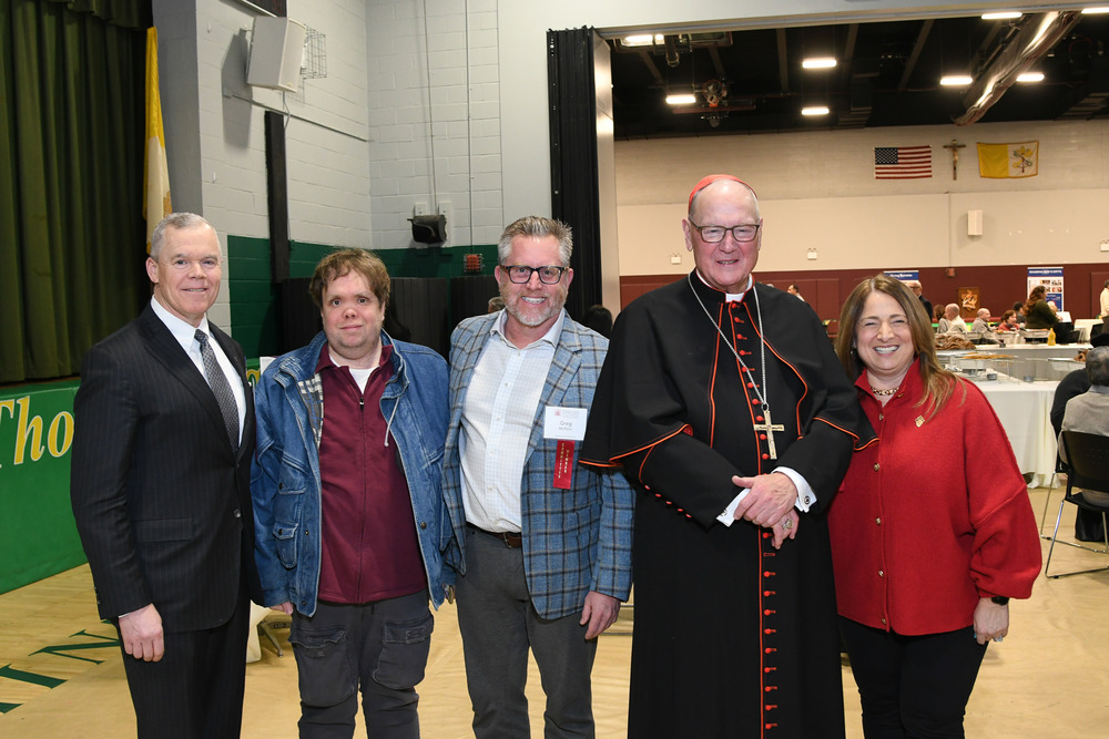 Cardinal Timothy Dolan joined parishioners, distinguished donors, and Cynthia Caruso Aquila, the evening’s Master of Ceremonies, on February 8, 2024 at Joseph-St. Thomas St. John Neumann Parish for a special Mass and reception honoring donors to the Cardinal’s Annual Stewardship Appeal. Photo credit: Photobureau