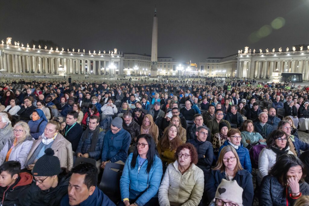 Hundreds of people pray the rosary for Pope Francis' health in St. Peter's Square at the Vatican March 14, 2025.