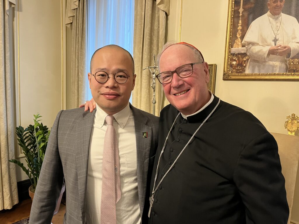 Cardinal Timothy Dolan, right, meets with Sebastien Lai, son of imprisoned Hong Kong media mogul Jimmy Lai, on Friday, March 14, 2025, in Manhattan.