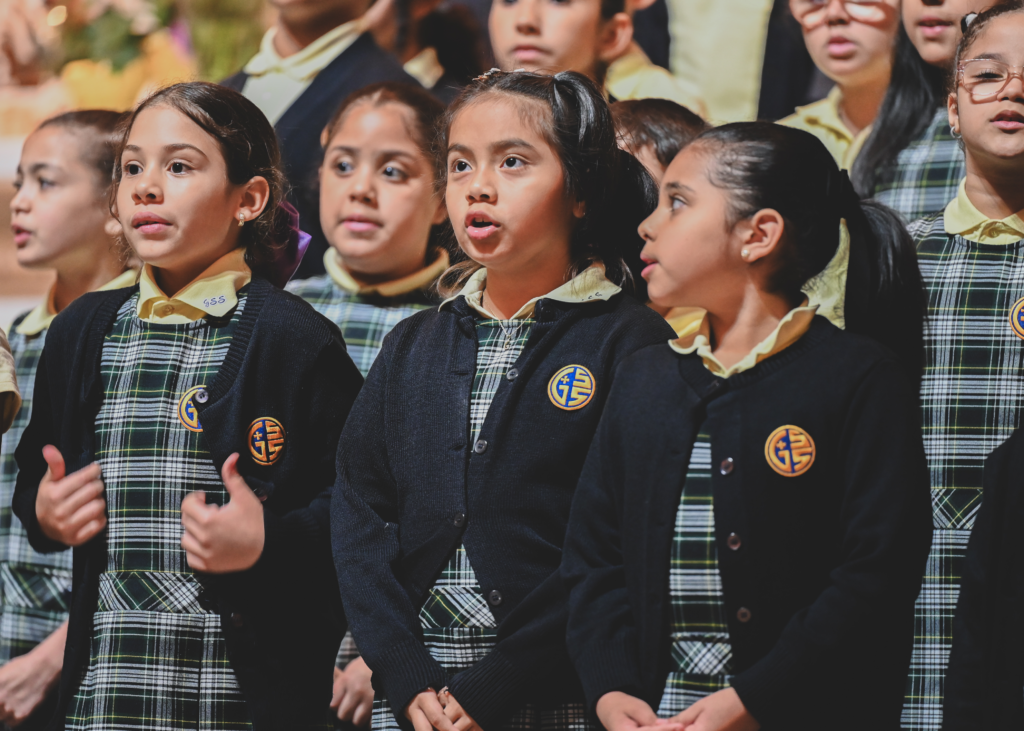 Members of the Good Shepherd School Choir lead worship during the special Centennial Mass for Good Shepherd School on May 15, 2025.