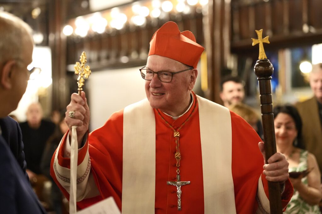 New York Cardinal Timothy M. Dolan processes at the beginning of an ecumenical prayer service for peace in the world in honor of Mary, Mother of God, at Our Lady of Lebanon Maronite Cathedral in the Brooklyn Heights section of Brooklyn, May 20, 2025.