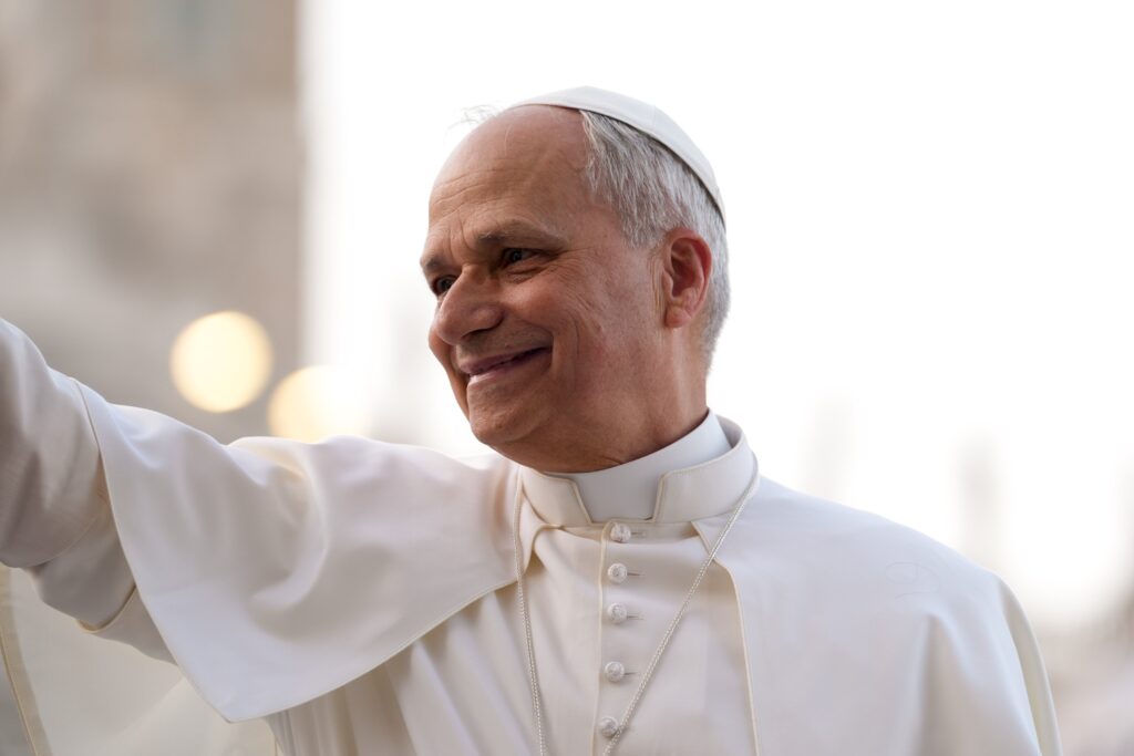 Pope Leo XIV waves from the Popemobile as he prepares to lead a Pentecost prayer vigil in St. Peter's Square at the Vatican on June 7, 2025, with participants in the Jubilee of Ecclesial Movements, Associations and New Communities.