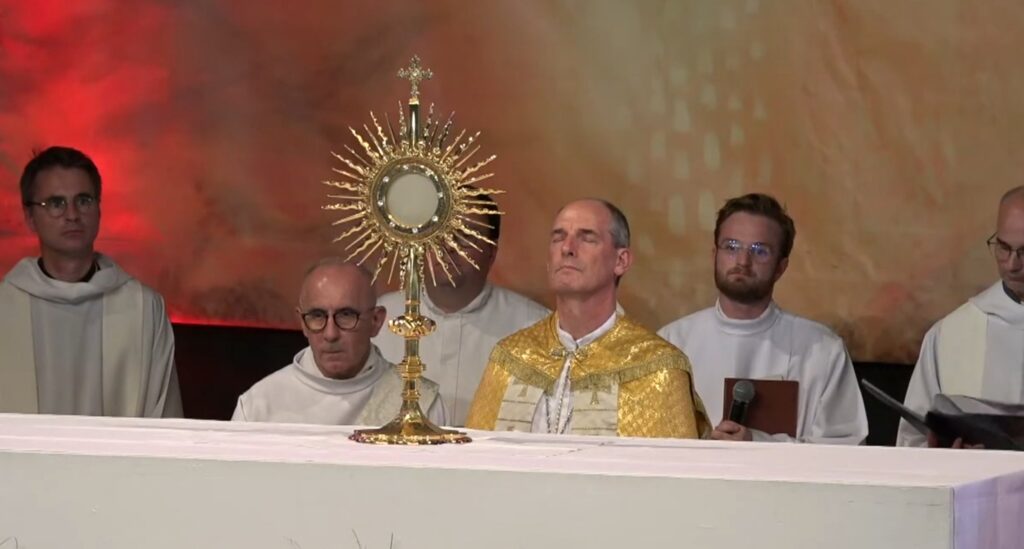 Cardinal François-Xavier Bustillo of Ajaccio, Corsica, is seen in a screenshot from a video leading the Holy Hour June 26, 2025, at the Shrine of the Sacred Heart of Paray-le-Monial, southeast of Paris.