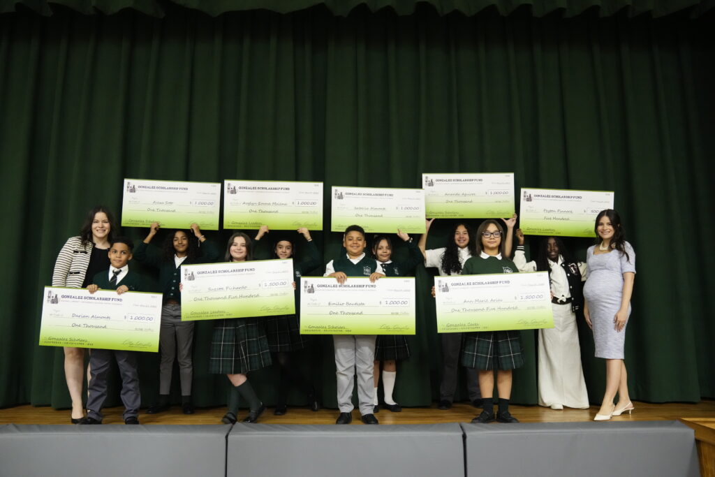 Cathy Gonzalez, right, and Kimberly Gonzalez, left, founders of the Gonzalez Scholarship Fund, present the inaugural cohort of scholarship recipients, from left, Darian Almonte, Alexa Soto, Suzette Pichardo, Avylyn Malena, Emilio Bautista, Isabella Almonte, Amanda Aguirre, Ann Marie Arias and Peyton Pinnock at the Gonzalez Scholarship Fund Inaugural Awards Ceremony on Thursday, May 29, 2025 in New York. Founded in 2025 by Cathy and Kimberly Gonzalez, the Gonzalez Scholarship Fund is a charitable initiative supporting students at St. Elizabeth School in Washington Heights, NYC. Photo: Charles Sykes/AP Content Services for Gonzalez Scholarship Fund