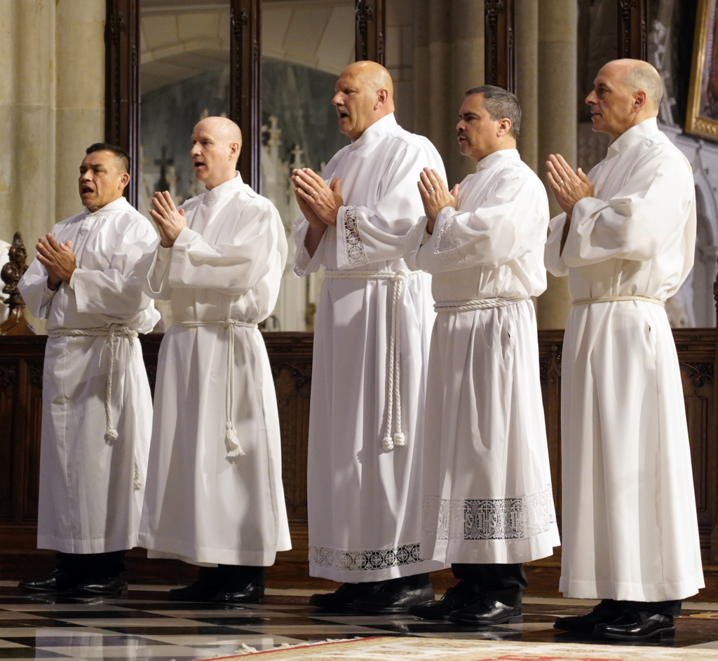 The five 2025 candidates for the permanent diaconate pray during their ordination on June 21, 2025, at St. Patrick’s Cathedral in Manhattan.