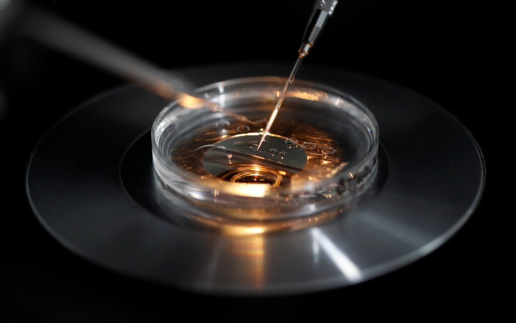 A medical lab technologist carries out an embryo vitrification protocol during an intra-cytoplasmic sperm injection process at a laboratory in Paris on September 13, 2019.