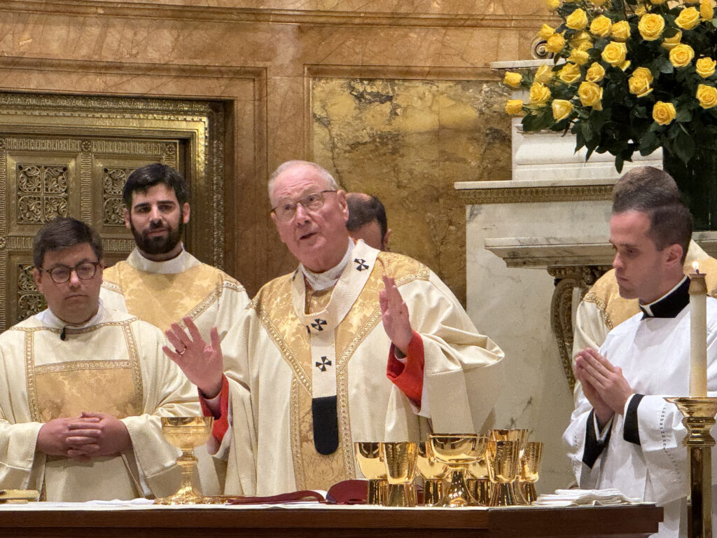 Cardinal Timothy Dolan (center) celebrates Mass at the ordination of Society of Jesus priests on June 14, 2025, at St. Ignatius Loyola Church in Manhattan.