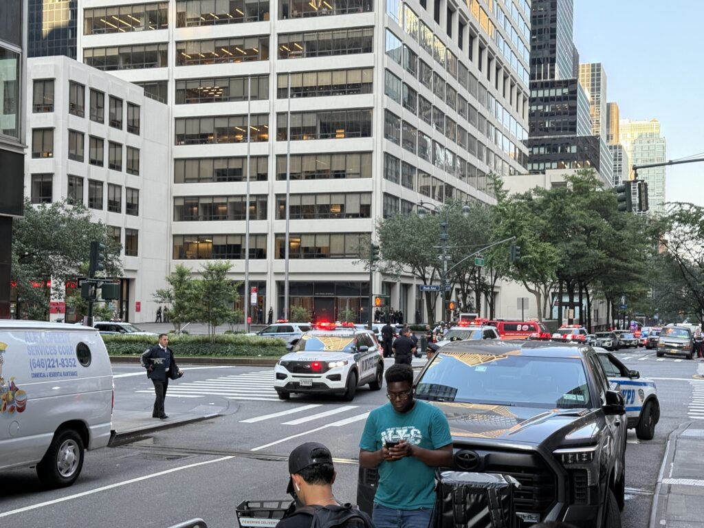New York Police Department (NYPD) officers close access to Park Avenue just east of St. Patrick's Cathedral in Manhattan during an active shooter incident on July 28, 2025.