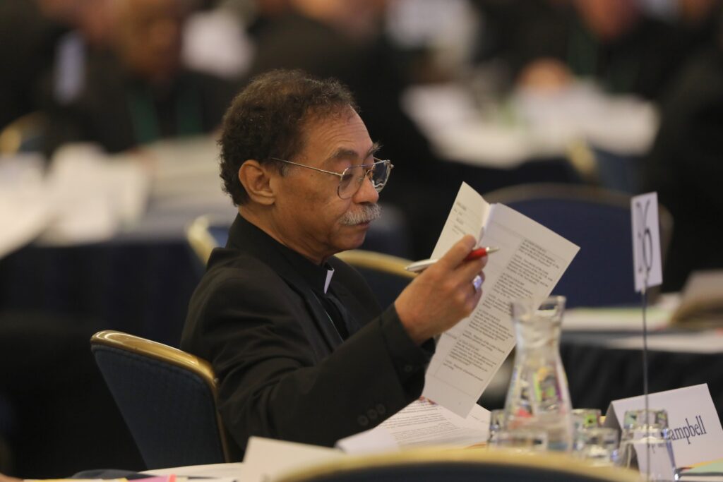 Washington Auxiliary Bishop Roy E. Campbell Jr., looks over paperwork during a November 15, 2023, session of the fall general assembly of the U.S. Conference of Catholic Bishops in Baltimore.