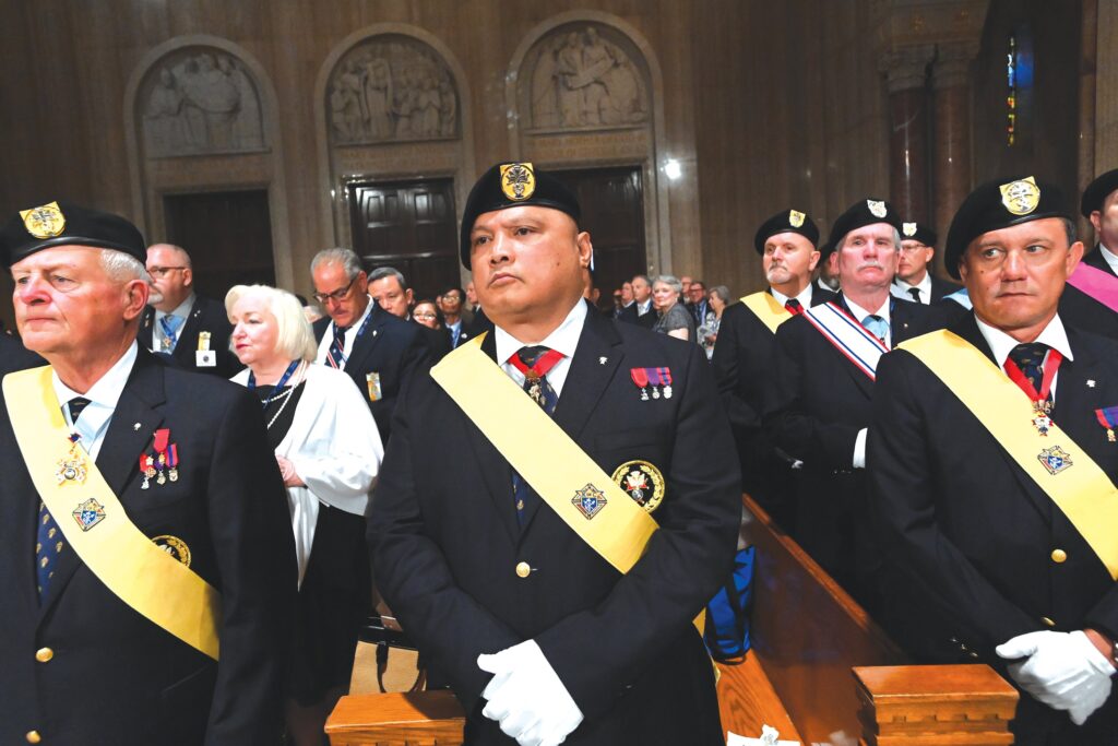 Members of the Knights of Columbus honor guard stand at attention during an August 5, 2025, Mass celebrated at the Basilica of the National Shrine of the Immaculate Conception in Washington to open the fraternal organization's 143rd Supreme Convention.