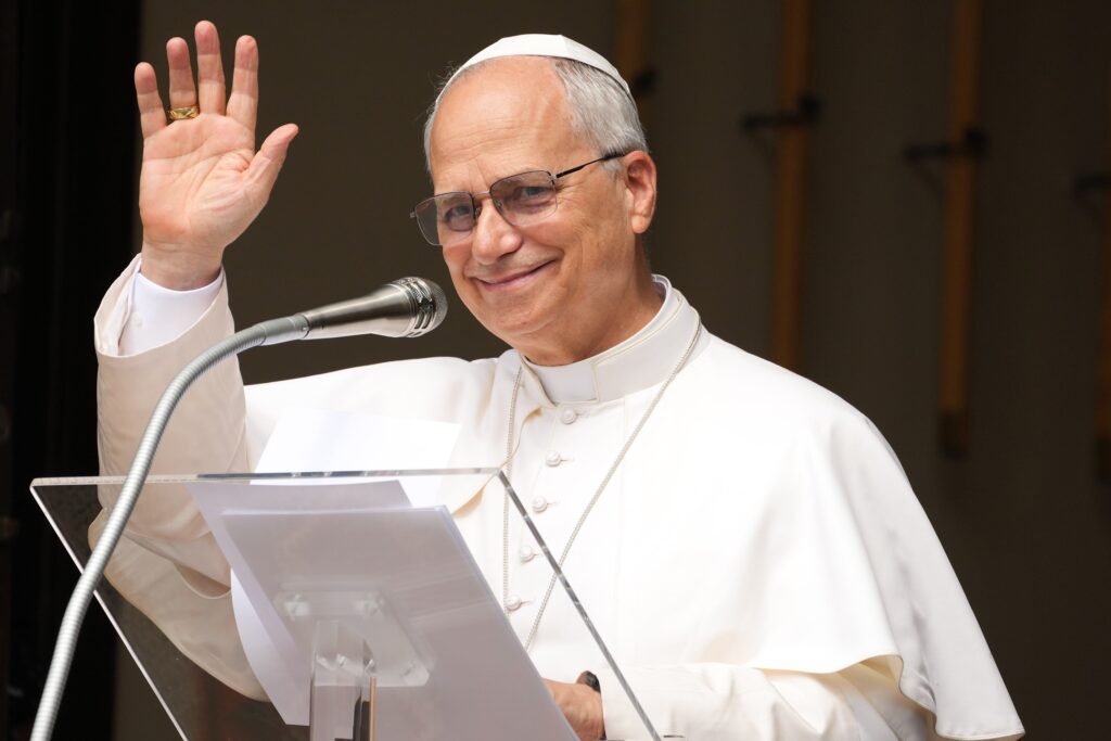 Pope Leo XIV greets visitors at the conclusion of the Angelus in Castel Gandolfo, Italy, on the feast of the Assumption of Mary, August 15, 2025.
