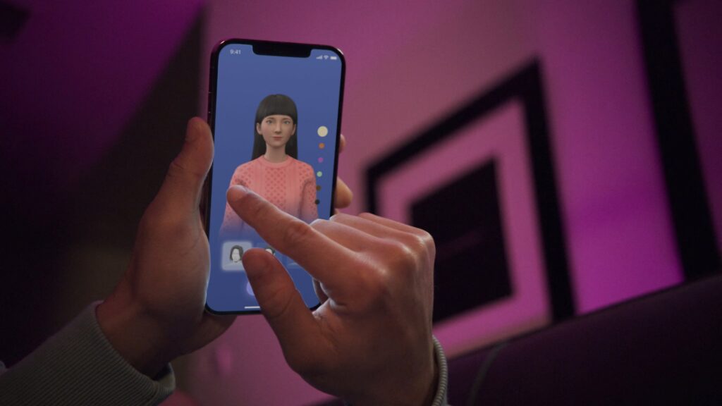 An undated handout image from U.S. startup Replika shows a user interacting with a smartphone app to customize an avatar for a personal artificial intelligence chatbot, known as a Replika, in San Francisco.