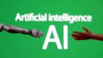 The words "Artificial intelligence AI" are pictured with a miniature of a robot arm and a toy hand in this Dec. 14, 2023, illustration. (Photo: OSV News/Dado Ruvic, Reuters)