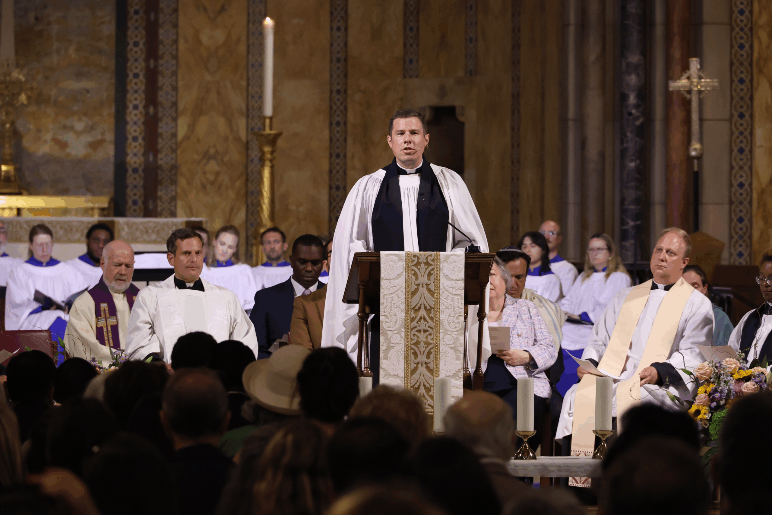 The Reverend Peter Thompson, Vicar and Interim Rector of St. Bartholomew’s Church, begins the prayer service with an assurance that St. Bart’s is a safe place to feel whatever emotions arise in the wake of tragedy.