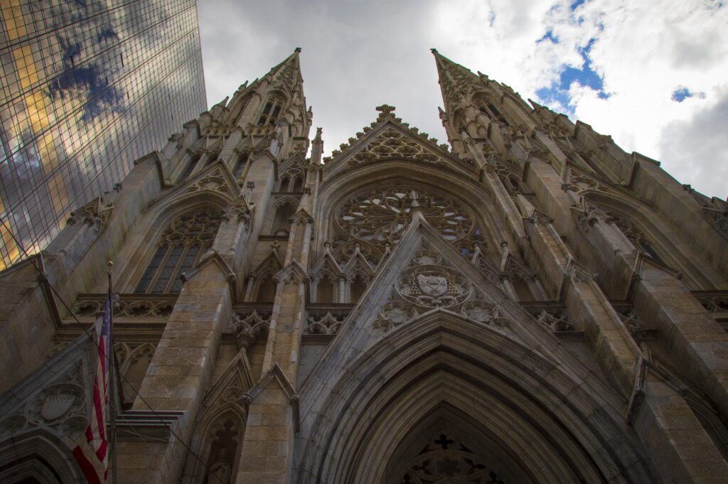 A U.S. flag hangs from New York's St. Patrick's Cathedral on September 15, 2019.