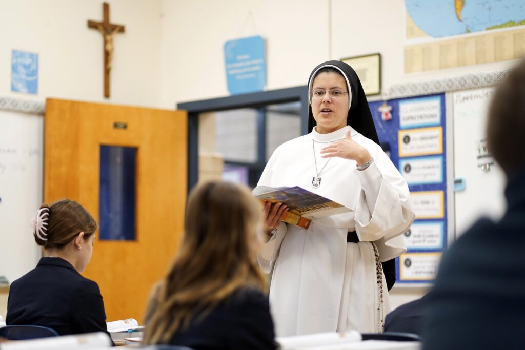 Sister Agnes Maria, a member of the Dominican Sisters of Mary, Mother of the Eucharist, is seen teaching a seventh-grade class on ancient civilization at St. Mary's Middle School in Manhasset on November 15, 2023.