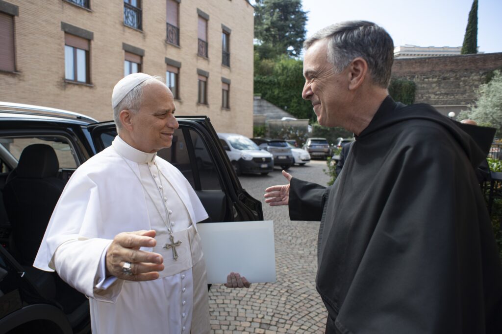 Pope Leo XIV greets Augustinian Father Joseph L. Farrell, the new prior general of the order, during a visit on September 15, 2025, to the Augustinianum Patristic Institute in Rome to meet with members of the Augustinian general chapter.
