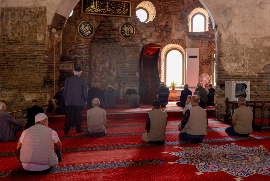 Worshippers attend a noon prayer at Hagia Sophia Mosque in the Turkish northwestern town of Iznik October 8, 2025, which was built by Romans as a place of worship, then converted to a church and later into a mosque by the Ottomans. Pope Leo XIV is expected to visit Turkey in November 27-30 for the 1,700th anniversary of the First Nicaea Council, as part of his first trip outside Italy. Photo: OSV News photo/Umit Bektas, Reuters