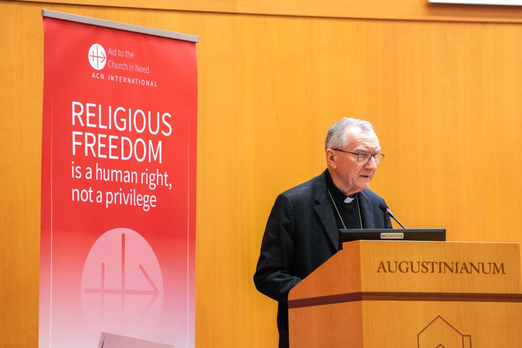 Cardinal Pietro Parolin, Vatican secretary of state, speaks about the 2025 Religious Freedom Report compiled by the papal foundation Aid to the Church in Need and released October 21, 2025, during a conference at Rome's Augustinianum Patristic Institute. Photo: CNS/Lola Gomez