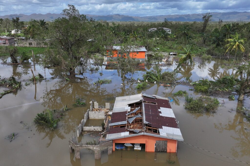 A drone view shows damaged homes and flooding in St. Elizabeth, Jamaica, on October 29, 2025, after Hurricane Melissa swept through the area.