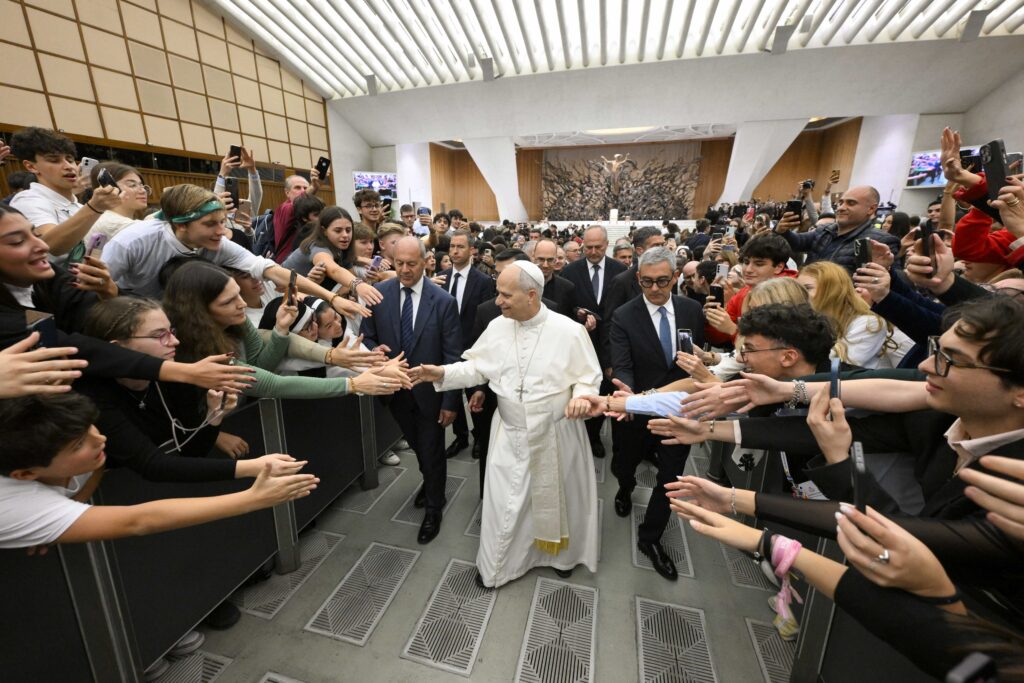 Pope Leo XIV greets students in the Paul VI Audience Hall at the Vatican October 30, 2025, as part of the Jubilee of the World of Education.