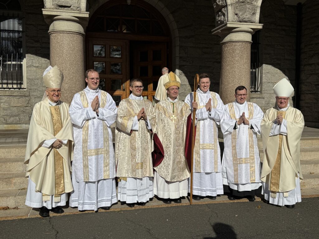 Bishop of Brooklyn Robert Brennan (center), Archdiocese of New York Auxiliary Bishop Gerardo Colacicco (right), and Rector of St. Joseph's Seminary Bishop James Massa pose with transitional deacons ordained on November 1, 2025, at St. Joseph's Seminary in Yonkers.