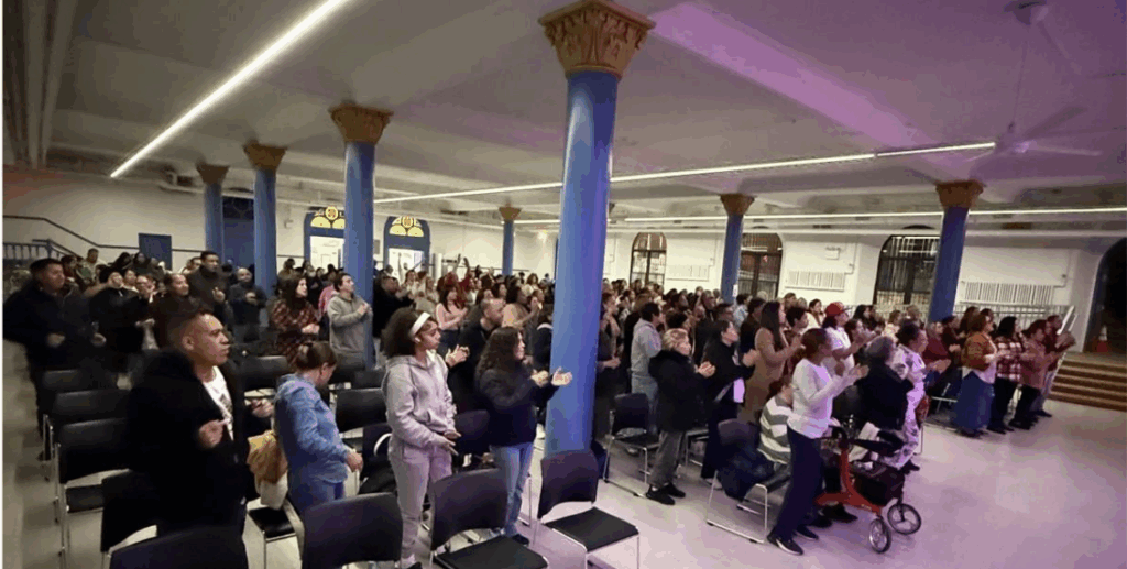 The faithful inside the Lower Hall of St. Luke's Church in the Bronx during a meaThe faithful inside the Lower Hall of St. Luke's Church in the Bronx during a meditation night, an evening of thanksgiving for the newly remodeled hall in October 2025.