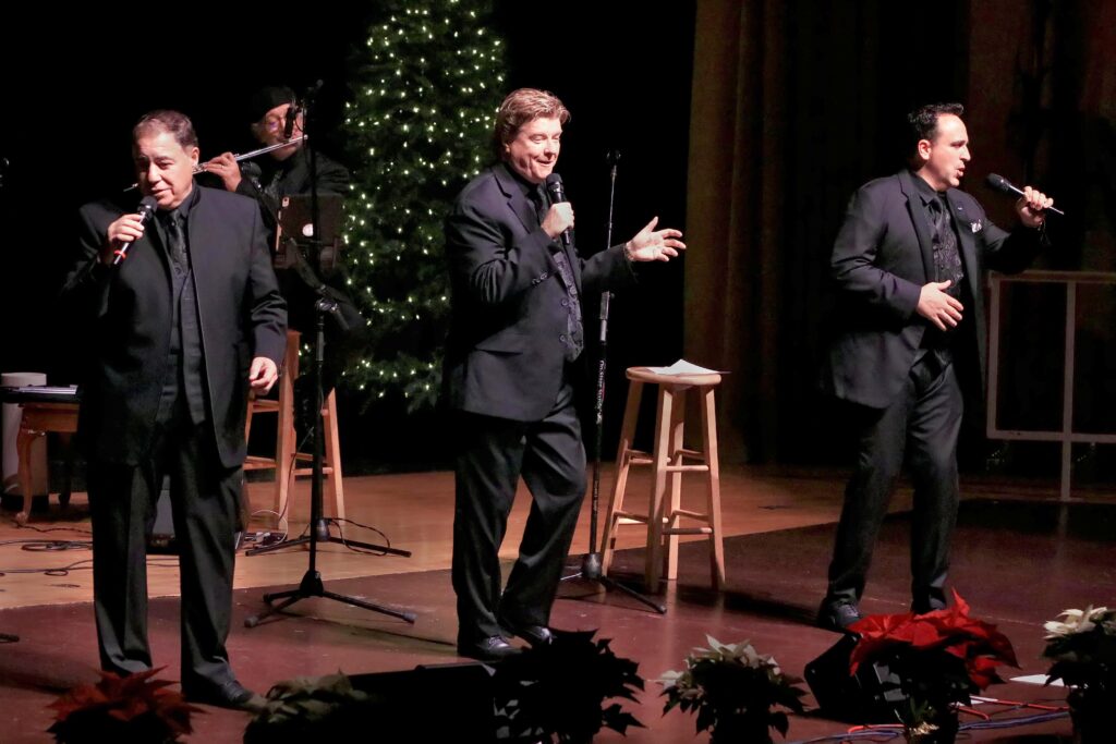 The New York Tenors -- Daniel Rodriguez, Andy Cooney and Christopher Macchio -- perform on December 10, 2023, at St. Mark’s High School in Wilmington, Delaware.