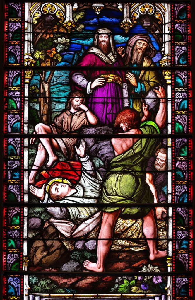 A stained-glass image at Good Shepherd Church in Chilton, Wisconsin, depicts the martyrdom of St. Stephen, the first deacon, by stoning.
