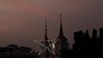 An illuminated Christmas star as the sun sets over St. Anthony Church, ahead of the Christmas celebrations in Karachi, Pakistan on December 18, 2025.