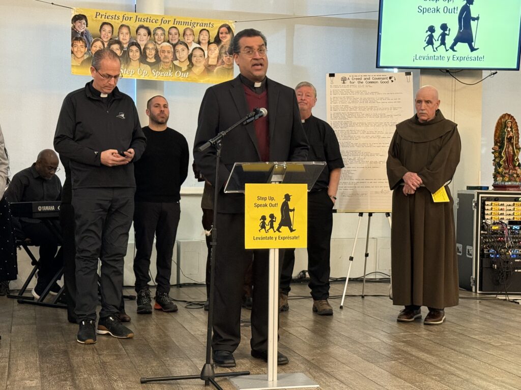 Father Eric Cruz speaks at an event celebrating the 900-mile, Chicago-to-New York walk by Father Gary Graf of the Archdiocese of Chicago, December 2, 2025 in Manhattan's Battery Park. Father Graf's walk was to call attention to issues surrounding migrant children in the U.S.