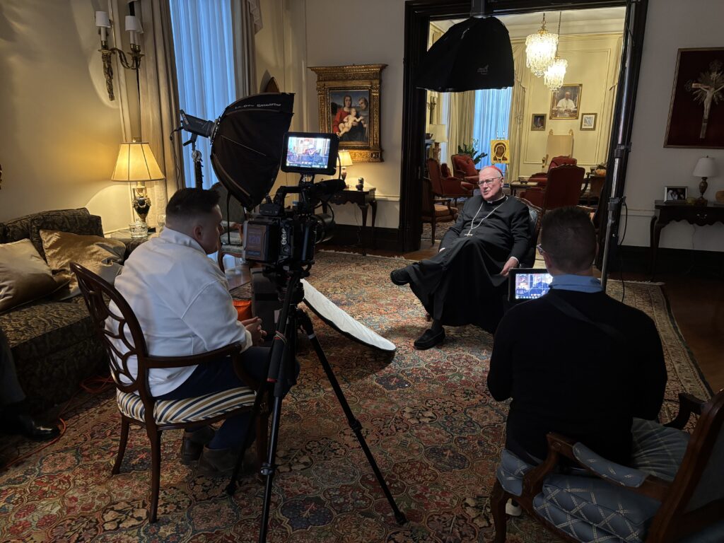 Bill Rose (left) and Dan Tarrant (right) interview Cardinal Timothy Dolan for their documentary "Matt Talbot: Urban Mystic," which had its New York premiere for The Sheen Center for Thought and Culture on December 15, 2025.