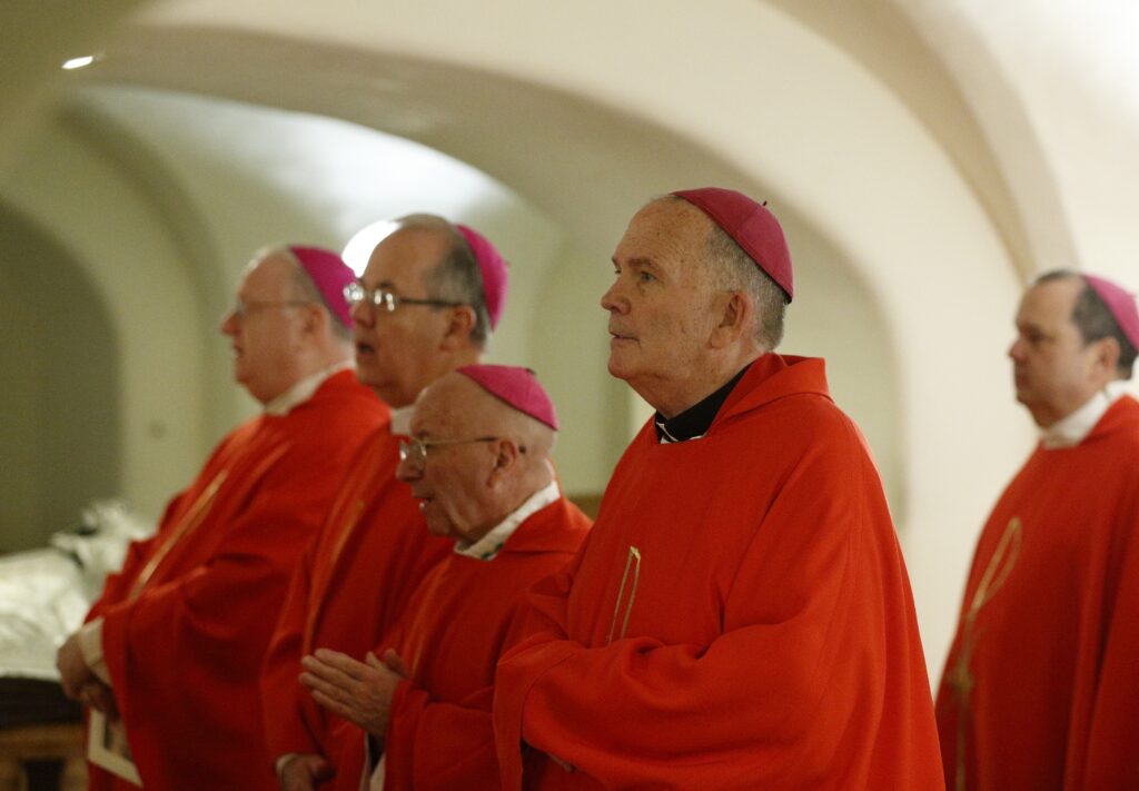 Bishop David M. O'Connell of Trenton, New Jersey, center, and other U.S. bishops from New Jersey and Pennsylvania concelebrate Mass in the crypt of St. Peter's Basilica at the Vatican November 29, 2019.