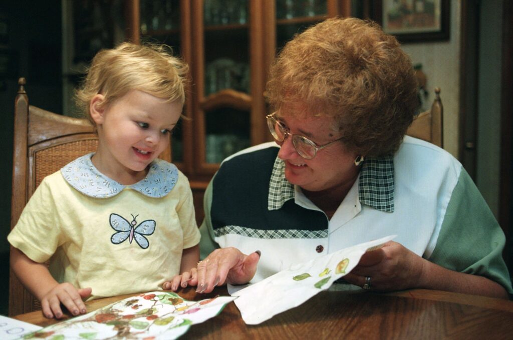 A grandmother spends quality time with her granddaughter in this illustration photo.