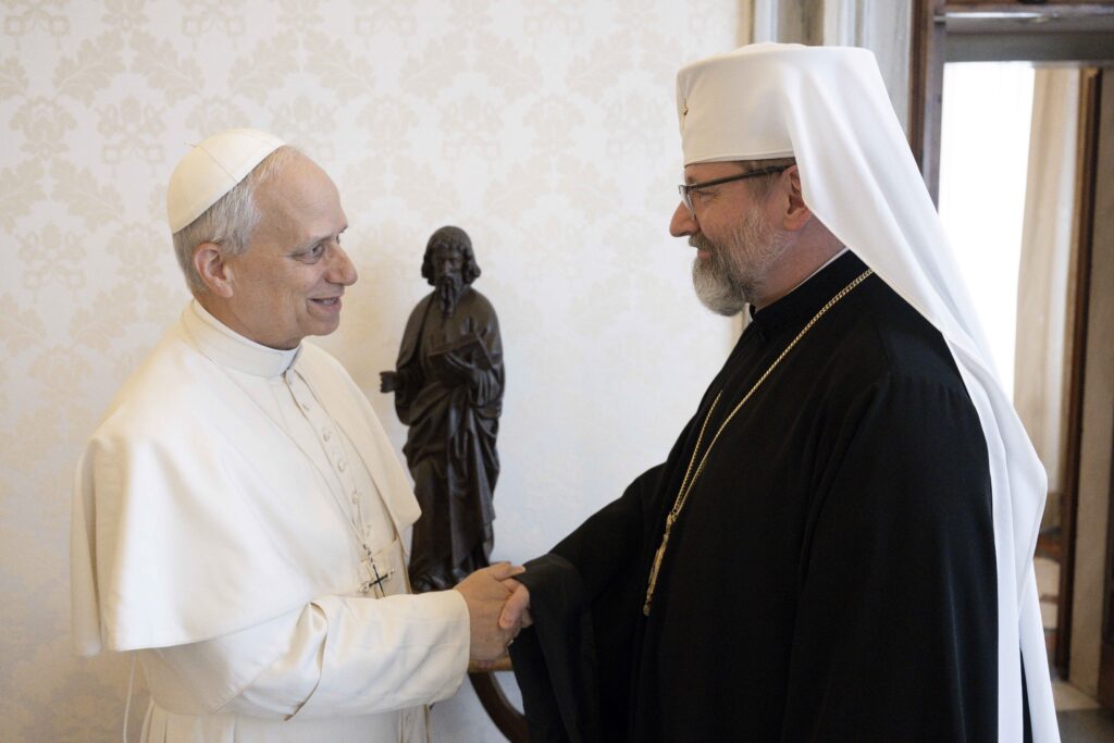 Pope Leo XIV greets Major Archbishop Sviatoslav Shevchuk of Kyiv-Halych, head of the Ukrainian Greek Catholic Church, in the library of the Apostolic Palace at the Vatican on May 15, 2025.