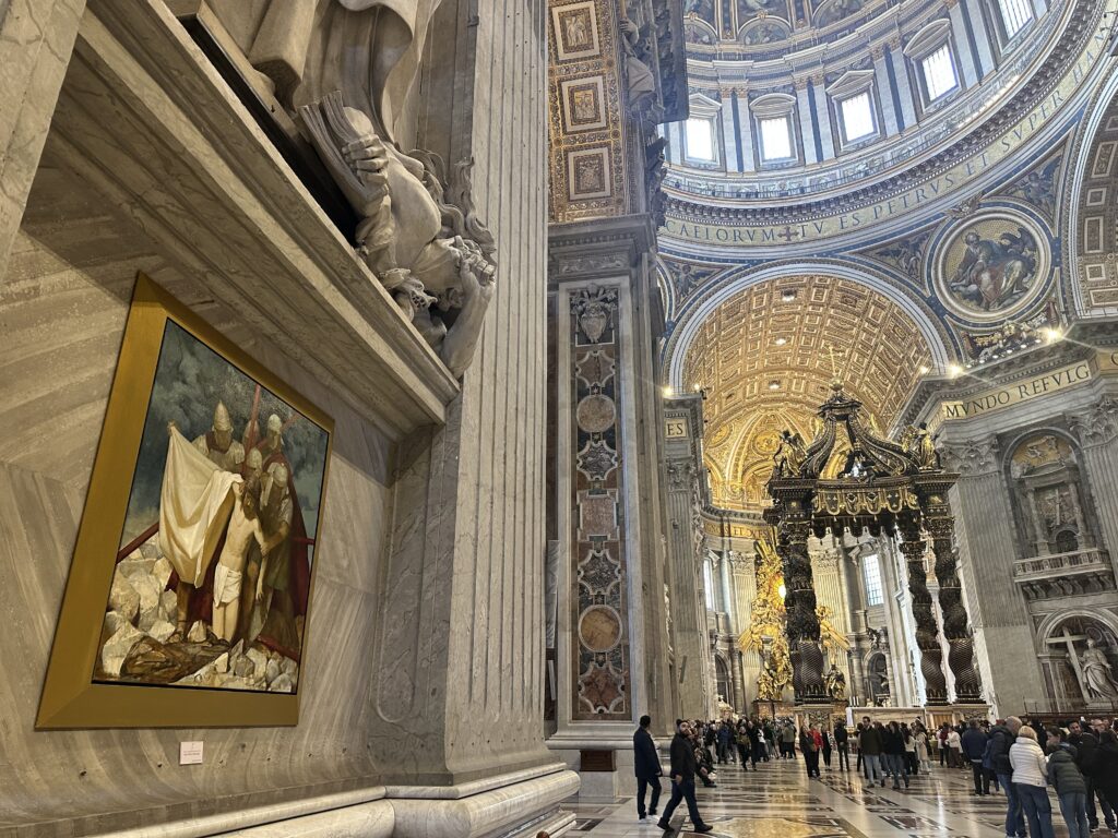 The 10th Station of the Cross, painted by a young Swiss artist who won the Vatican's international art competition, is displayed in St. Peter's Basilica.
